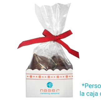 Deliciosos besos de chocolate empacados en caja de regalo